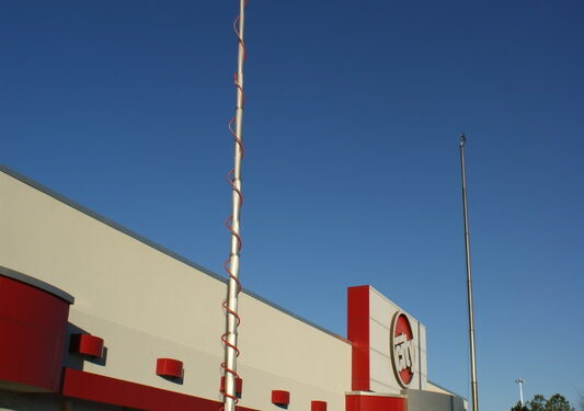 Results image of news van and AD RV in front of Circuit City