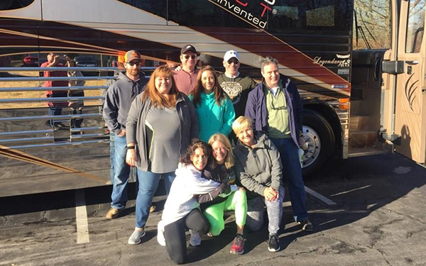 Results image of AD crew with tour bus in Tallahassee