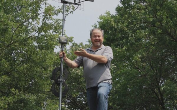 Results image of Tom Kozial on roof with Antennas Direct antenna