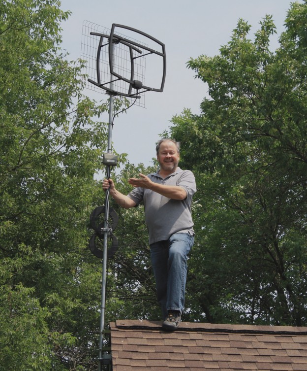 Results image of Tom Kozial on roof with Antennas Direct antenna