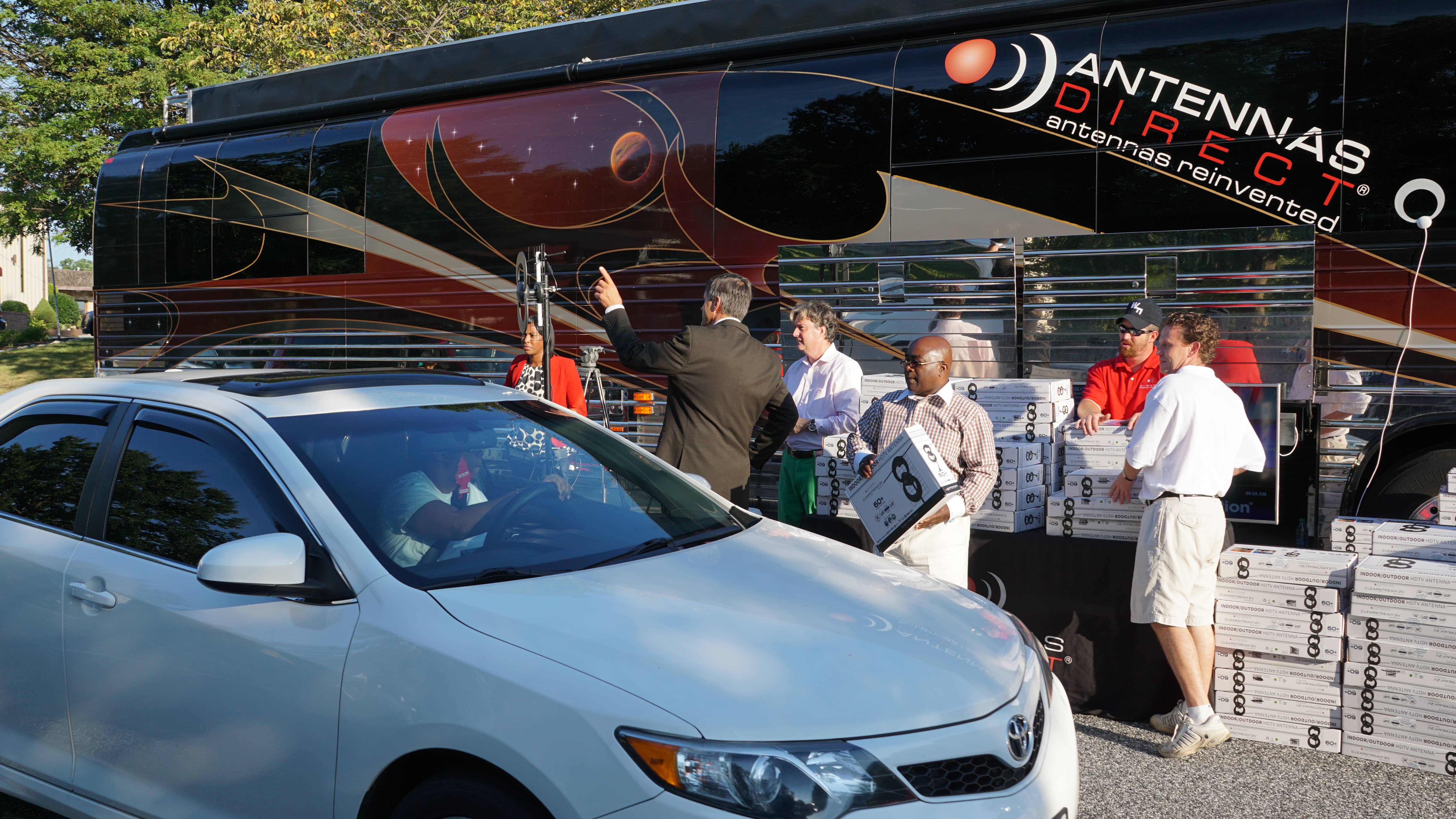 Results image of group in front of Antennas Direct bus Baltimore Maryland