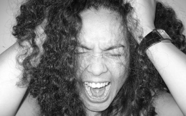 Results image of woman screaming and pulling hair