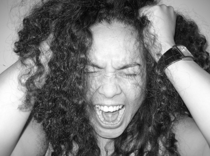 Results image of woman screaming and pulling hair