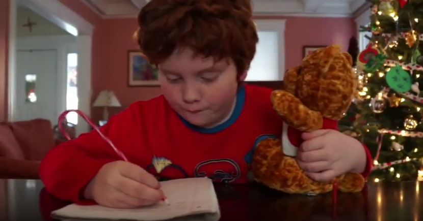 Results image of child writing letter to Santa