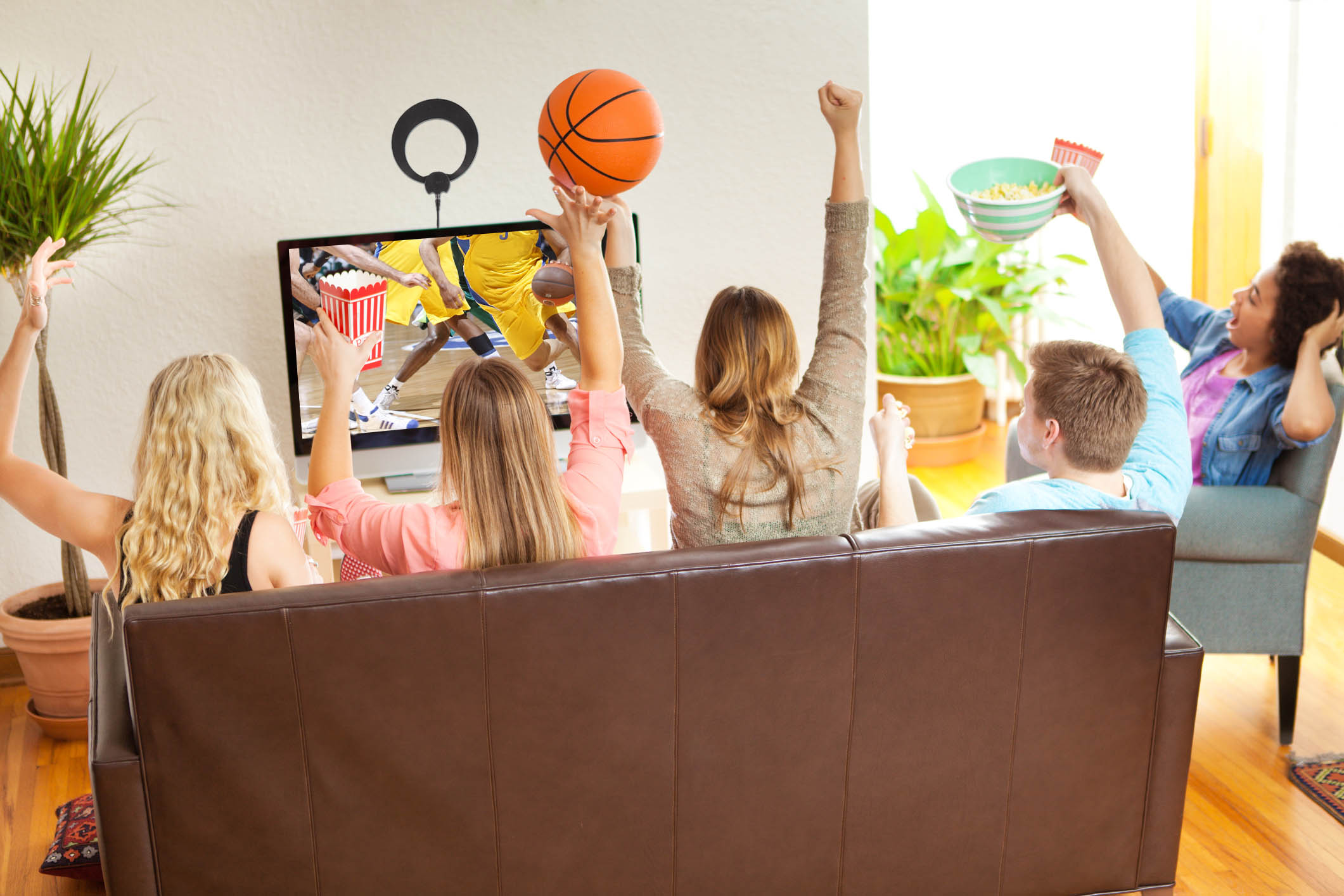 Results image of group of people watching Basketball with antenna