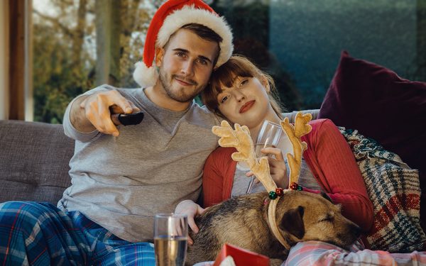 Results image of couple with dog and remote