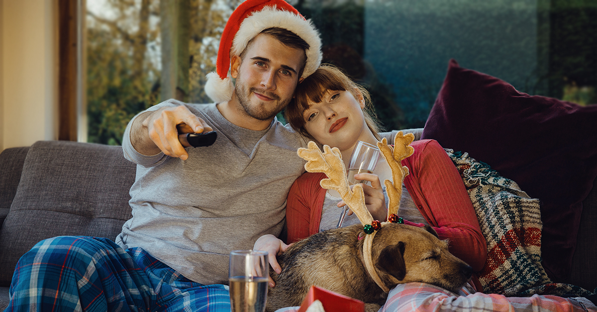 Results image of couple with dog and remote