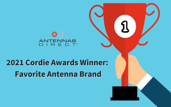 Antennas Direct Named the Cordie Awards Favorite Antenna Brand for 2021, hand holding trophy