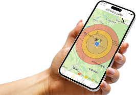 hand holding a phone with the Antenna Point app open on screen
