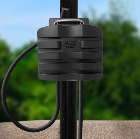 Zoomed in lifestyle photo of the ClearStream JUICE Plus TV Antenna Amplifier on a mast